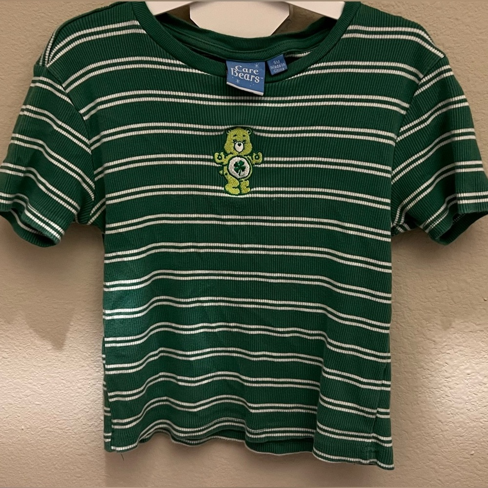 Care Bears Women's Short Sleeve Graphic T-Shirt in Green Luck Size SM